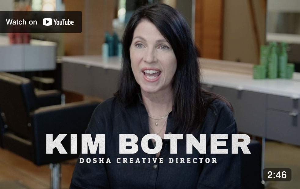 Image of Master Stylist Kim Botner in a video explaining the process of imprinting flowers in hair